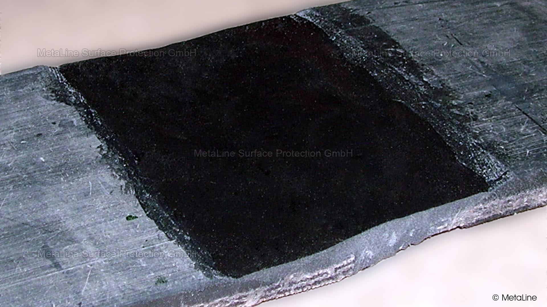 Coating scheme to protect a belt fastener
