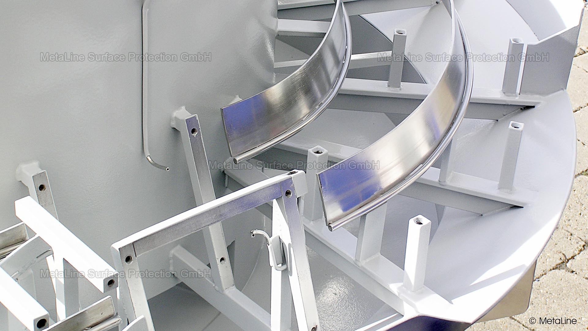 Revestimiento interior en transportador vibrante en espiral