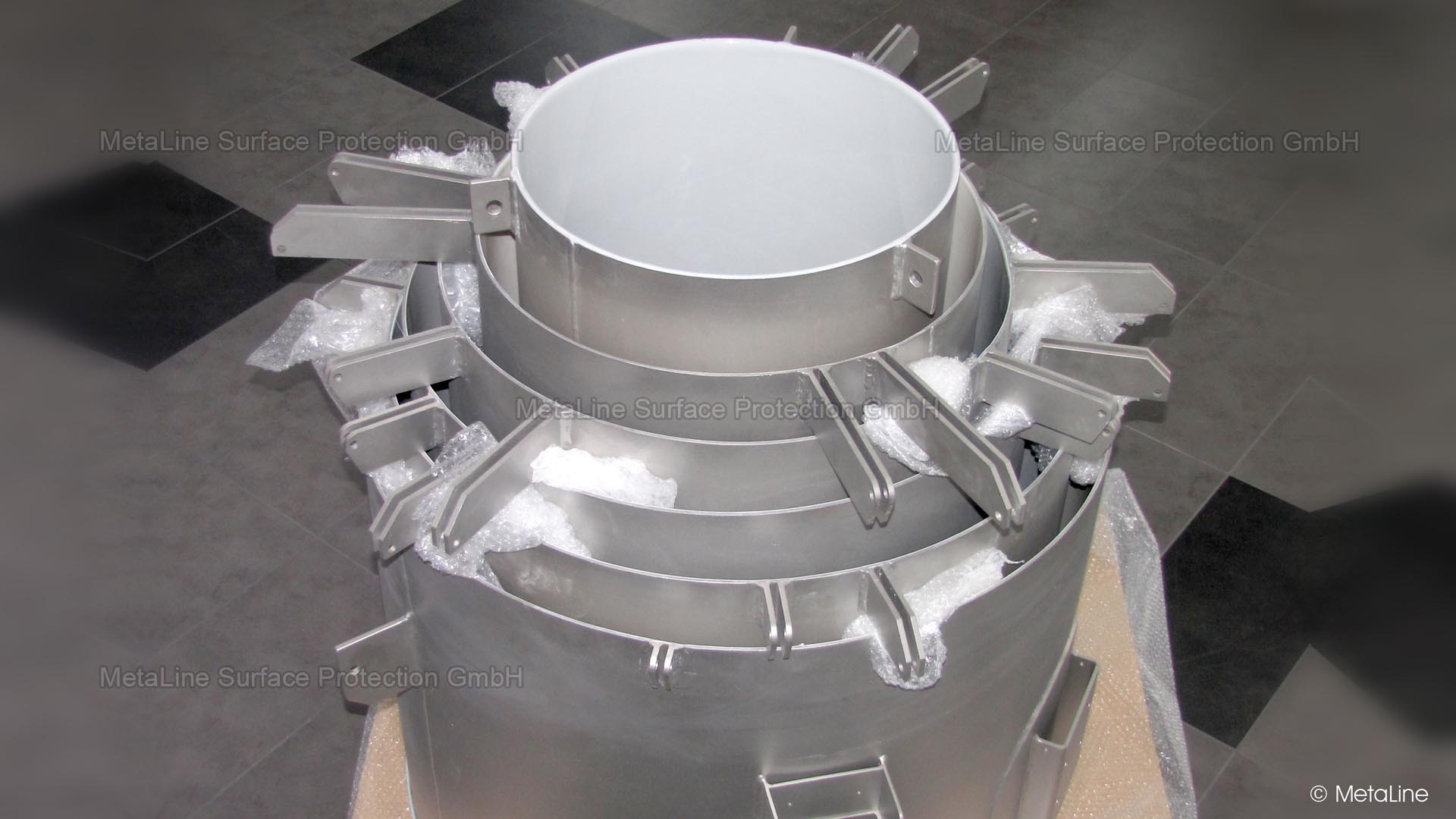 Paquete de tubo telescópico, revestido com 2 mm de MetaLine 795 como revestimento antiaderente e protecção contra o desgaste para a produção de cimento