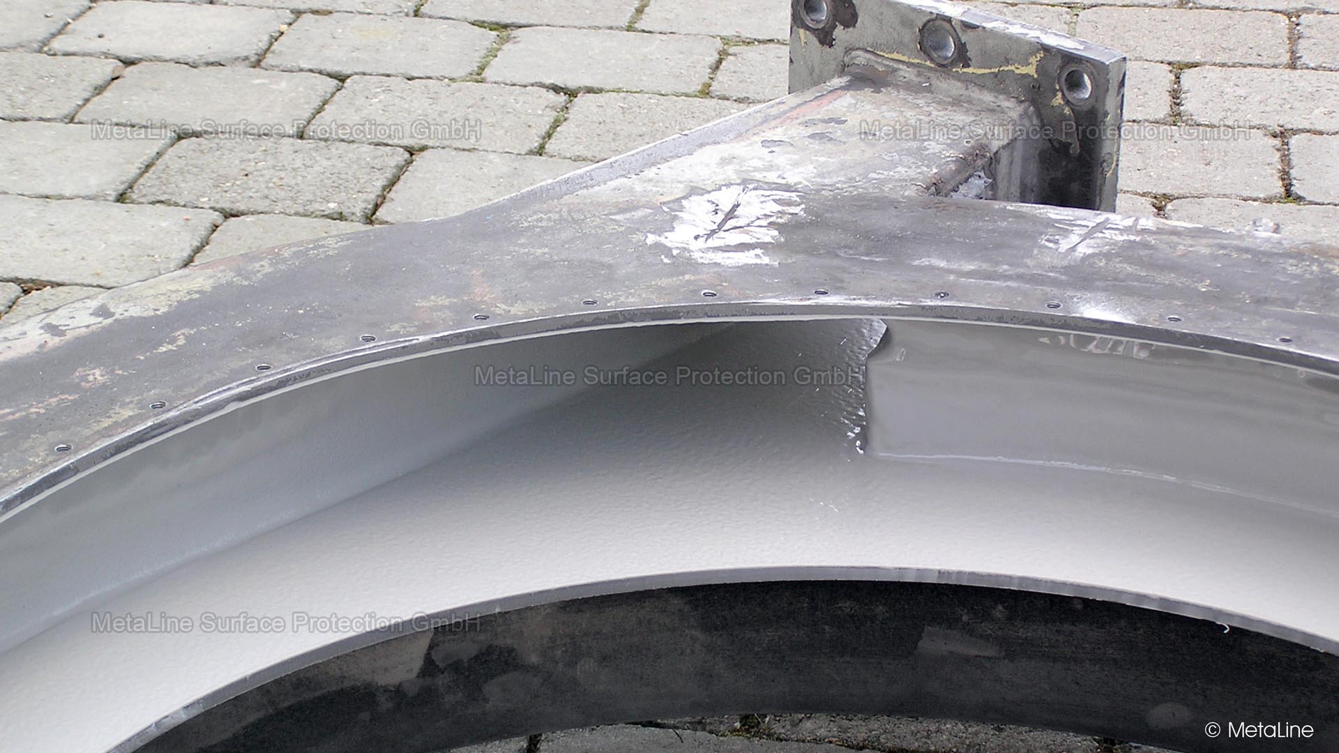 Centrifuge lining - solids extraction system of a metal goods factory protected with MetaLine 785. Coating thickness is always a question of load: mechanical, thermal and chemical - in this case it was 8 mm (1/3 #) due to the increased temperatures