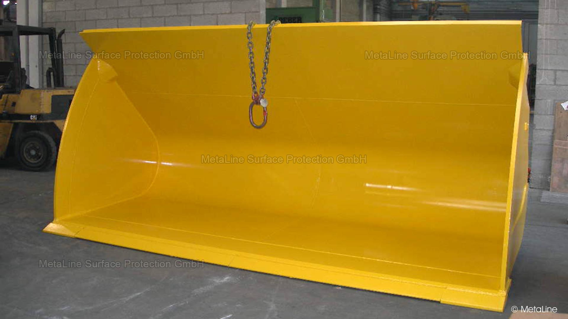 Revestimento antiaderente com 2 mm de MetaLine 795 de pás que transportam materiais finos